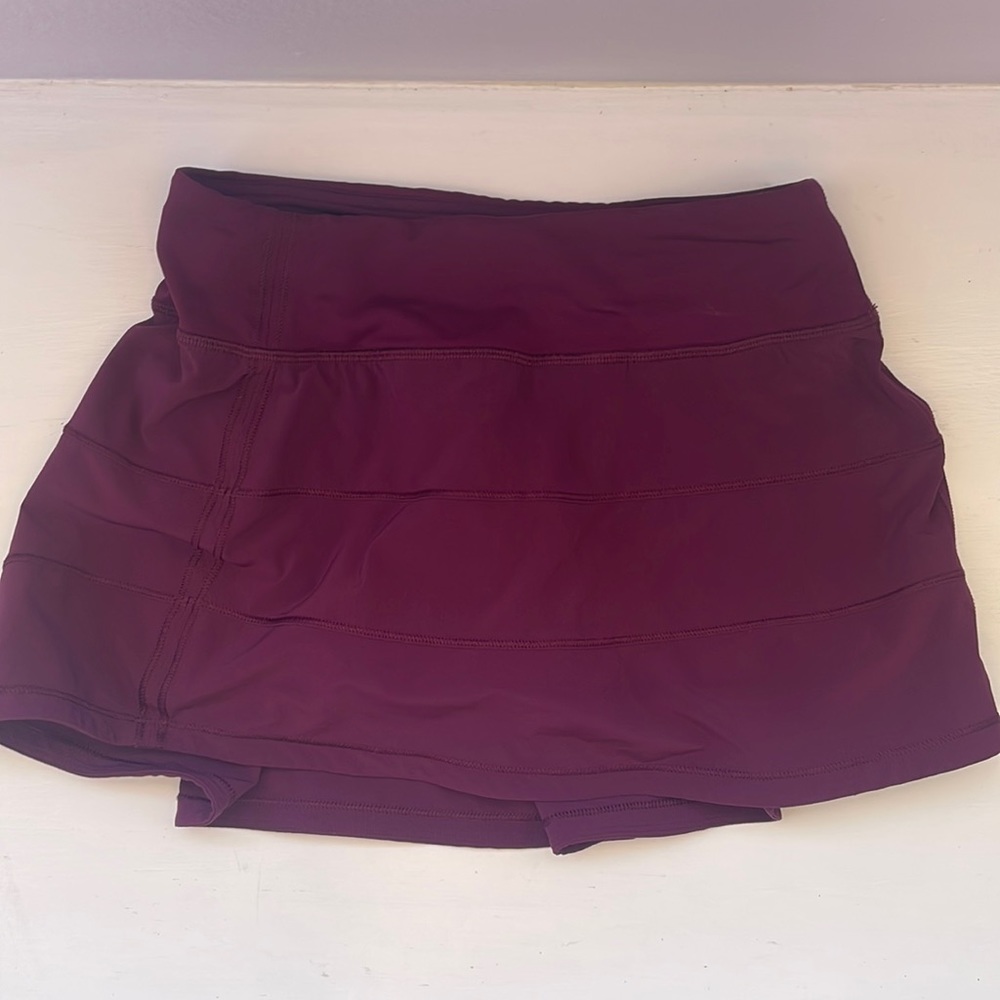 Lululemon size 2 skirt with built in shorts. Purple ish color